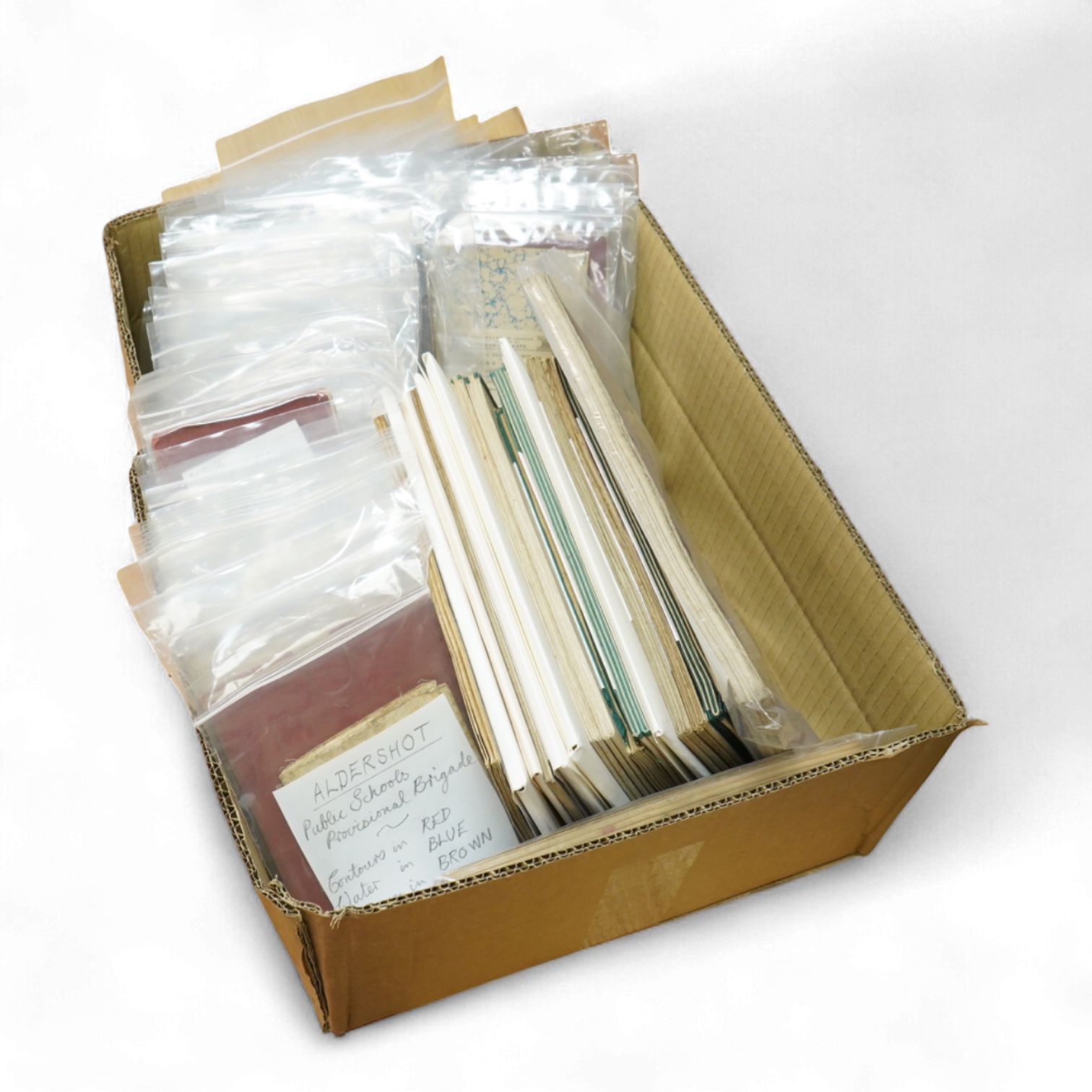 A collection of mid 19th to early 20th century Ordnance Survey maps, including some unusual issues, quarter-inch large sheet folded maps with marbled covers and green cotton edges, etc.